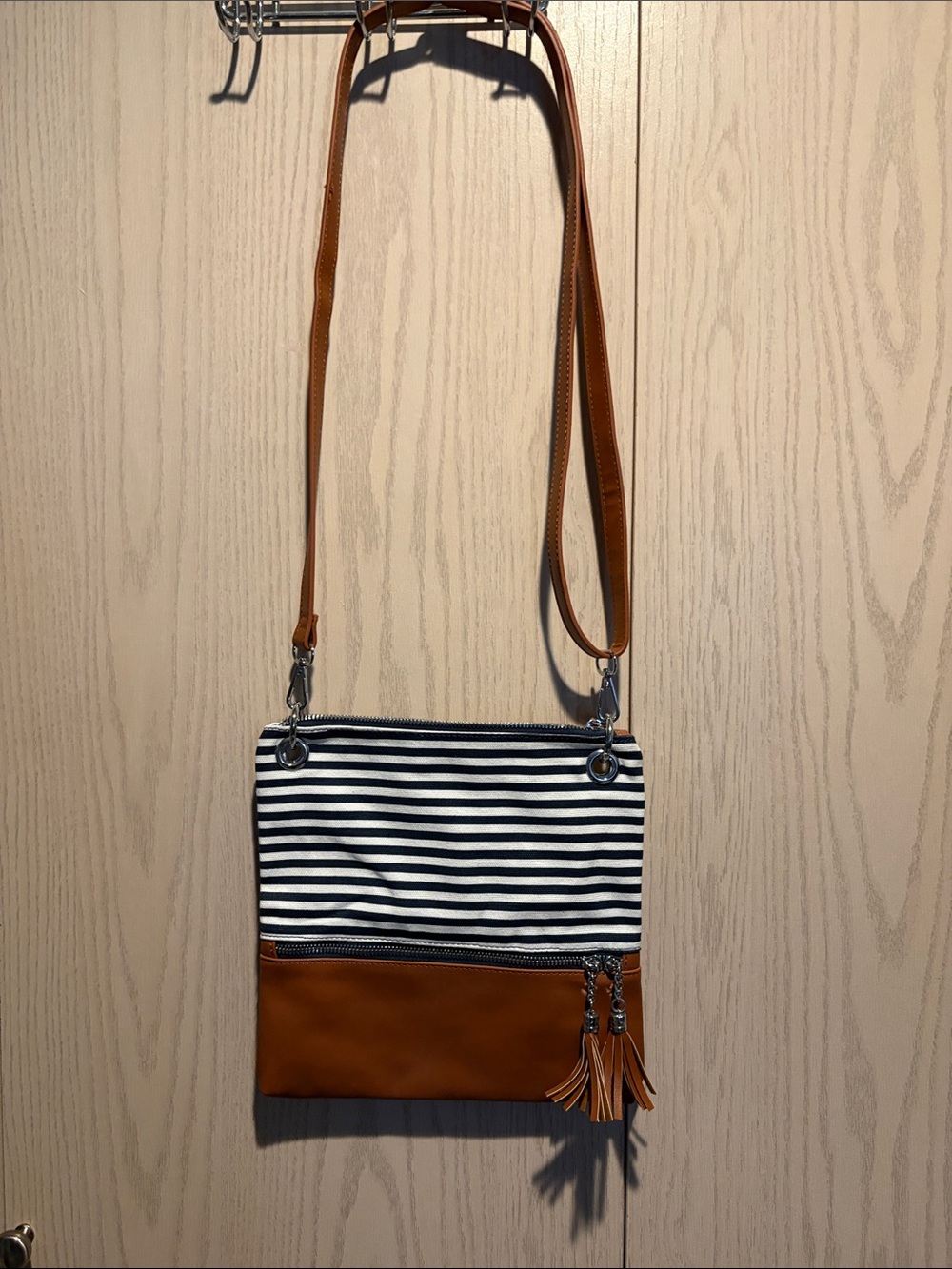 Striped Navy and Tan Crossbody Bag with Tassel Detail